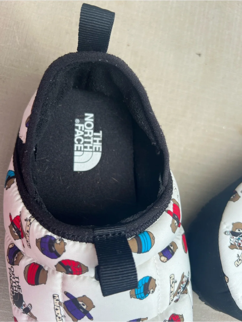 The North Face White Quilted Slip-On Slippers with Multicolor Bear Print